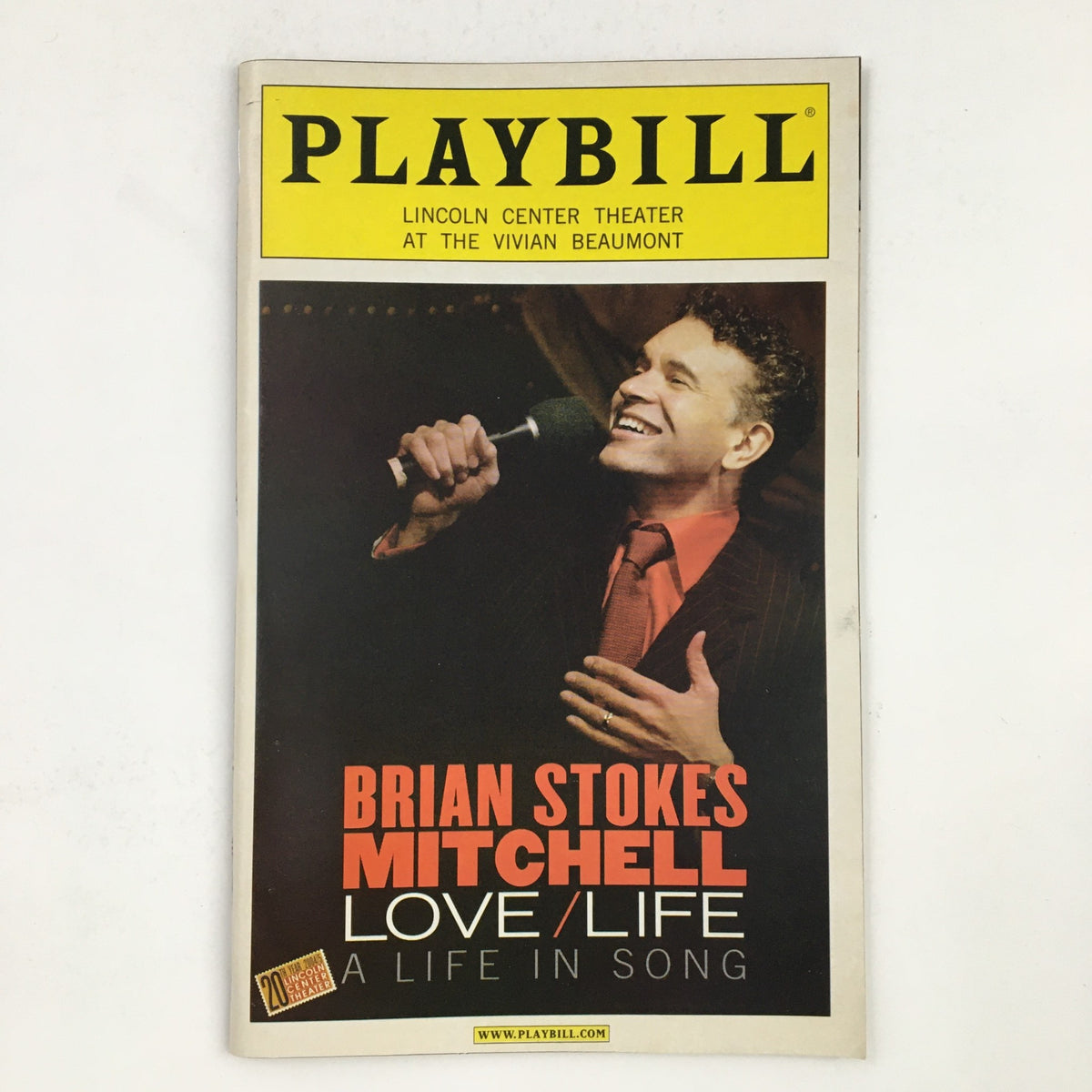 2005 Playbill for Lincoln Center Theatre featuring Brian Stokes Mitchell in Love/Life, showcasing a vibrant performance.