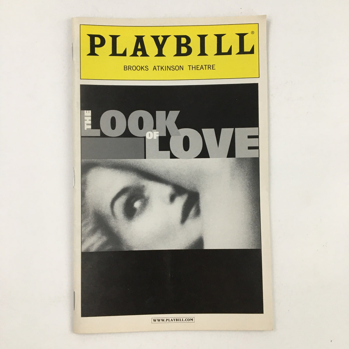 Cover of the 2003 Playbill for 'The Look of Love' at Brooks Atkinson Theatre featuring striking black and white imagery.