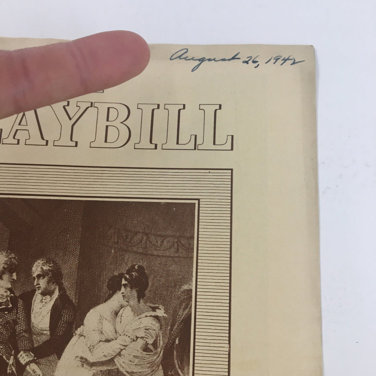 Close-up view of the 1942 Playbill for My Sister Eileen featuring the title and a handwritten date, adding a unique touch to this collectible theatre memorabilia.