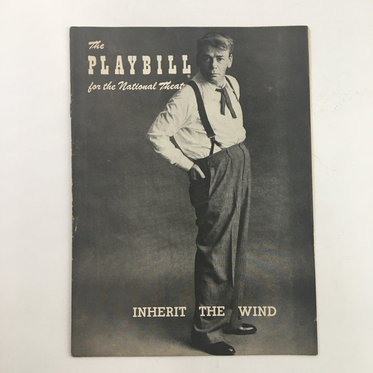 Front cover of the 1956 Playbill for the National Theatre, featuring Paul Muni in Inherit The Wind, showcasing vintage theater memorabilia.