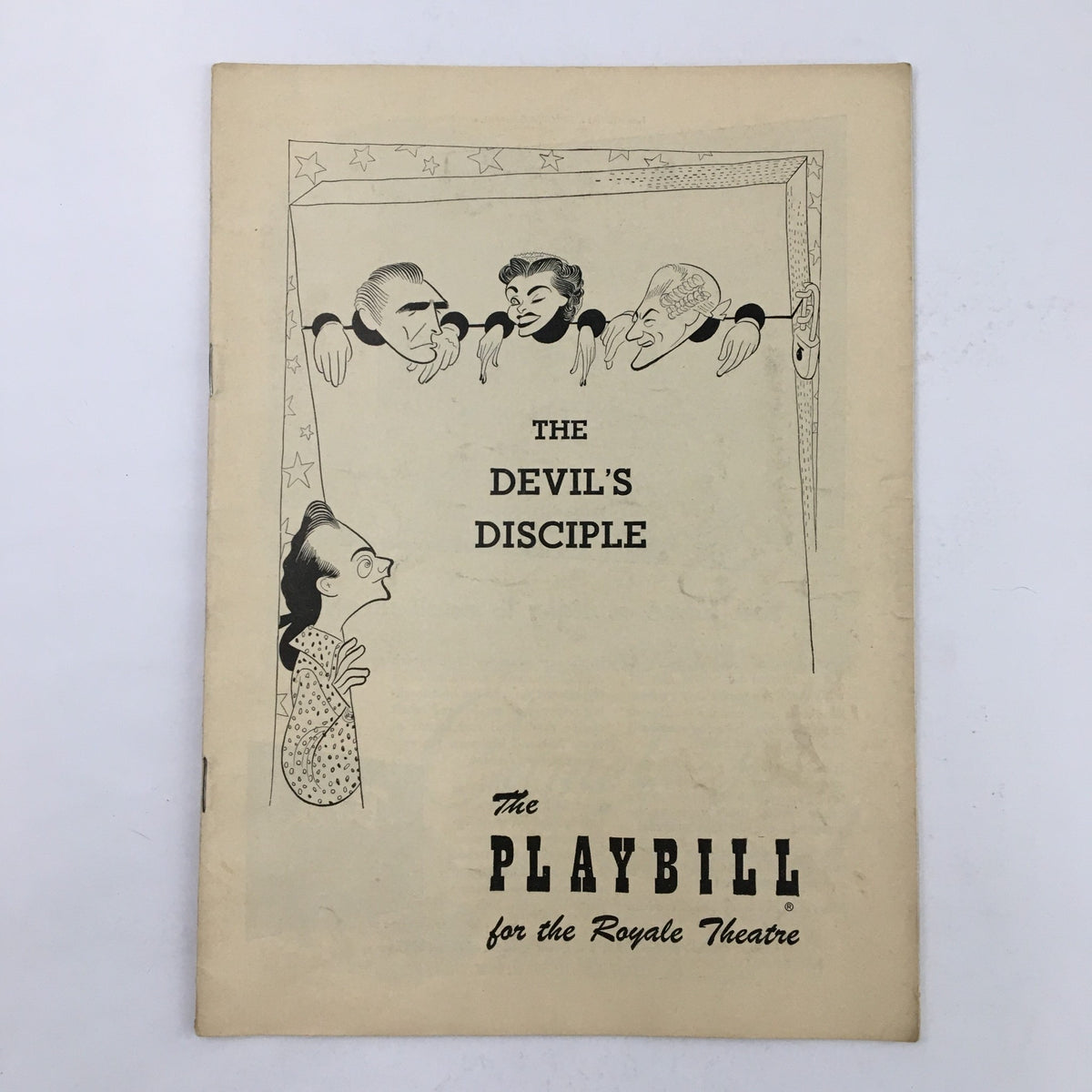 Cover of the 1950 Playbill for The Devil's Disciple at the Royale Theatre featuring a whimsical illustration and the title prominently displayed.