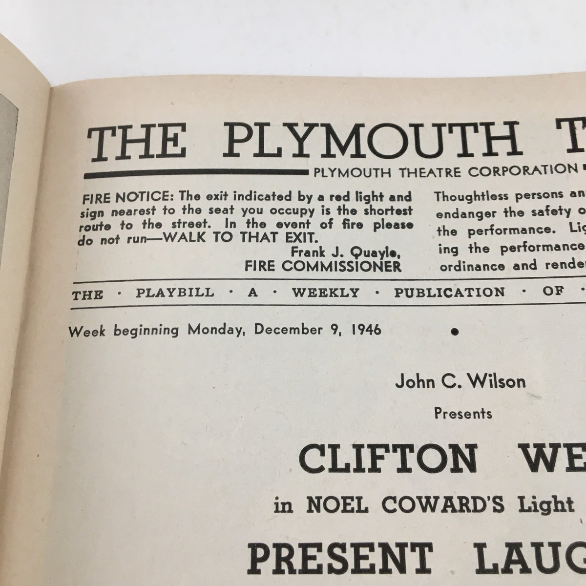 Close-up of the 1946 Playbill for Present Laughter, including fire safety notice and performance details at The Plymouth Theatre.