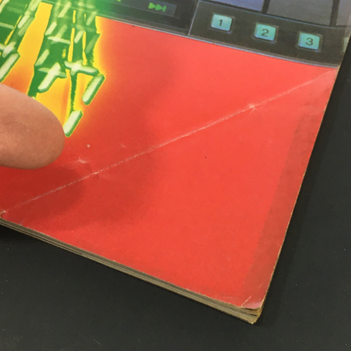 Close-up view of the bottom left corner of the October 1984 Stereo Review Music Magazine, showing the Sony CD player details and worn edges.