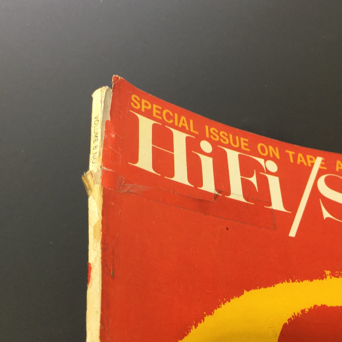 Side view of the Vintage HiFi Stereo Review Magazine March 1962, displaying its slightly damaged spine and volume information.