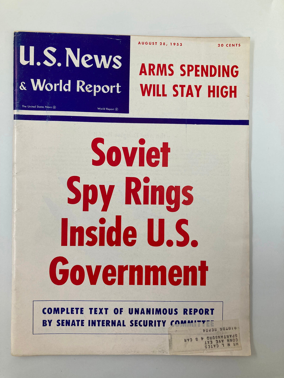 Cover of US News & World Report Magazine, August 28, 1953, featuring the headline 'Arms Spending Will Stay High' and a piece on 'Soviet Spy Rings Inside U.S. Government'. This vintage magazine captures a significant moment in Cold War history.