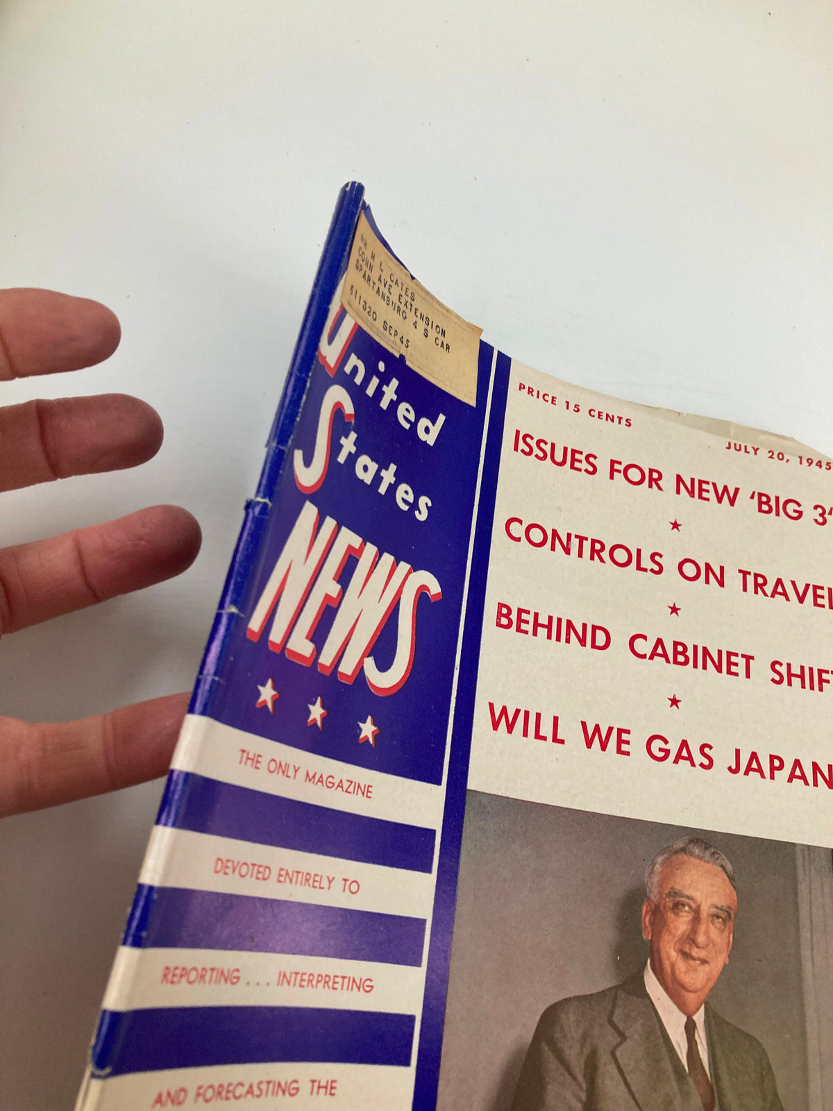 Side view of the US News & World Report Magazine July 20, 1945, including the cover details and small label, showcasing the vintage appeal of this historical publication.