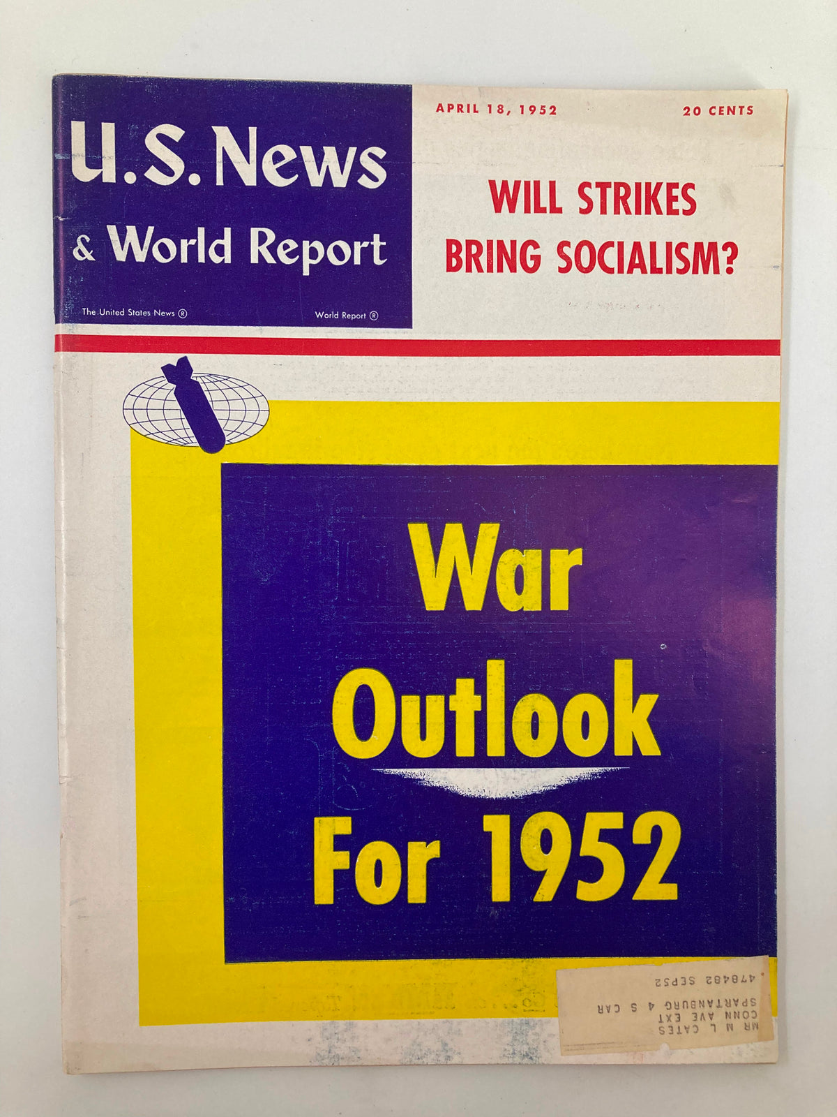 Cover of US News & World Report Magazine from April 18, 1952, featuring the title 'Will Strikes Bring Socialism?' with a bold yellow and purple design and the text 'War Outlook For 1952' prominently displayed.