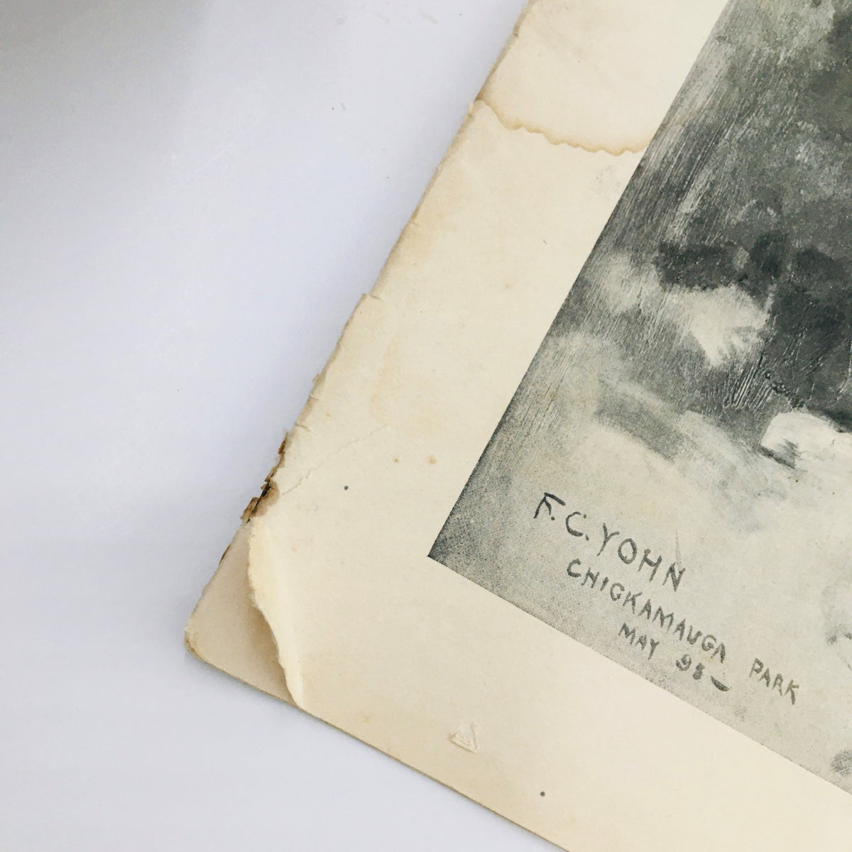 Close-up of the corner of a vintage magazine page from Collier's Weekly May 21 1898 Vol 21 #7, featuring a signature by F.C. Yohn.
