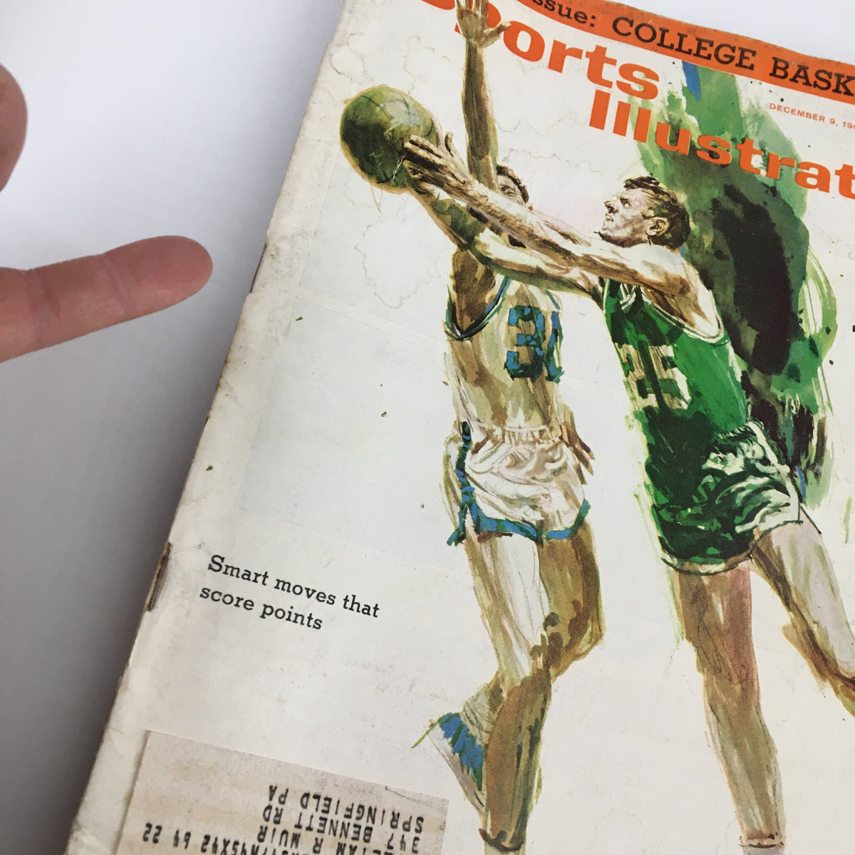 Close-up view of the VTG Sports Illustrated Magazine cover from December 9, 1963 highlighting the phrase 'Smart moves that score points'.