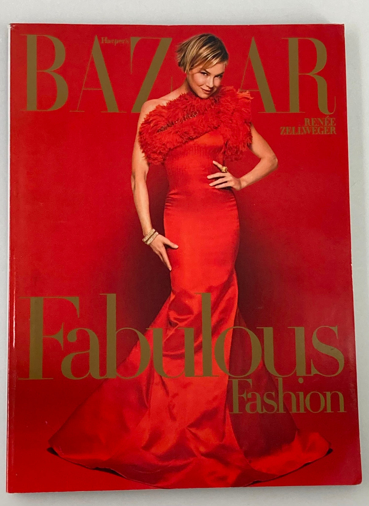 Cover of Harper's Bazaar Magazine December 2007 featuring Renee Zellweger in a striking red dress, highlighting fashion trends of the era.