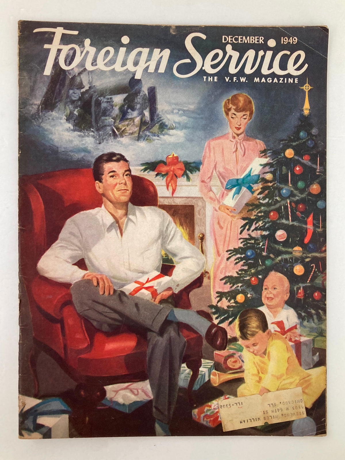 Cover of VTG Foreign Service Magazine December 1949 Vol 37 #4 featuring a family celebrating Christmas with gifts by a tree and a cozy fireplace, titled 'In Contrast with Christmas Sea'.