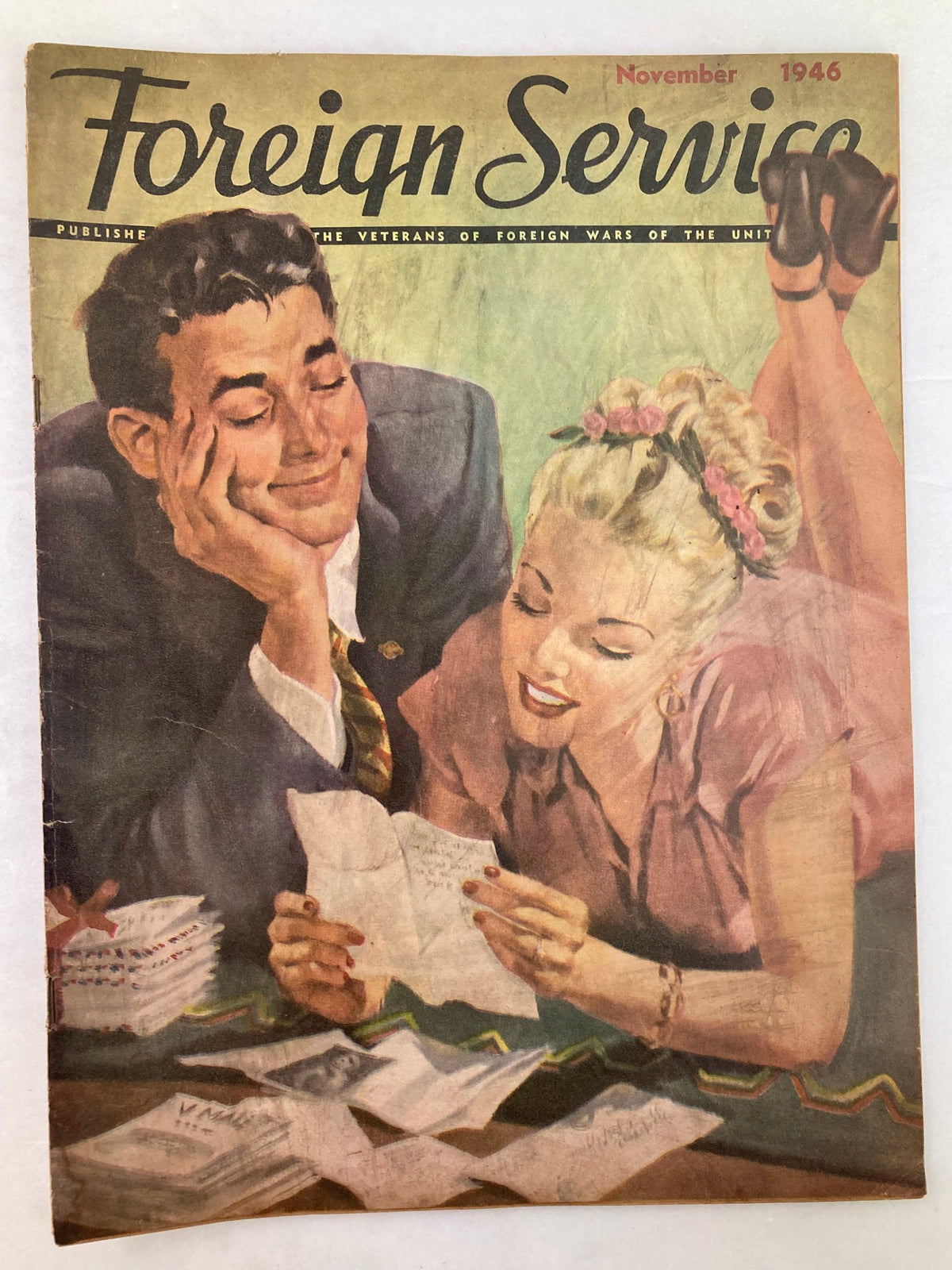 VTG Foreign Service Magazine November 1946 Vol 34 #3 Love Letters For Her cover featuring a smiling couple engaged in reading letters, encapsulating the romantic theme of the magazine.