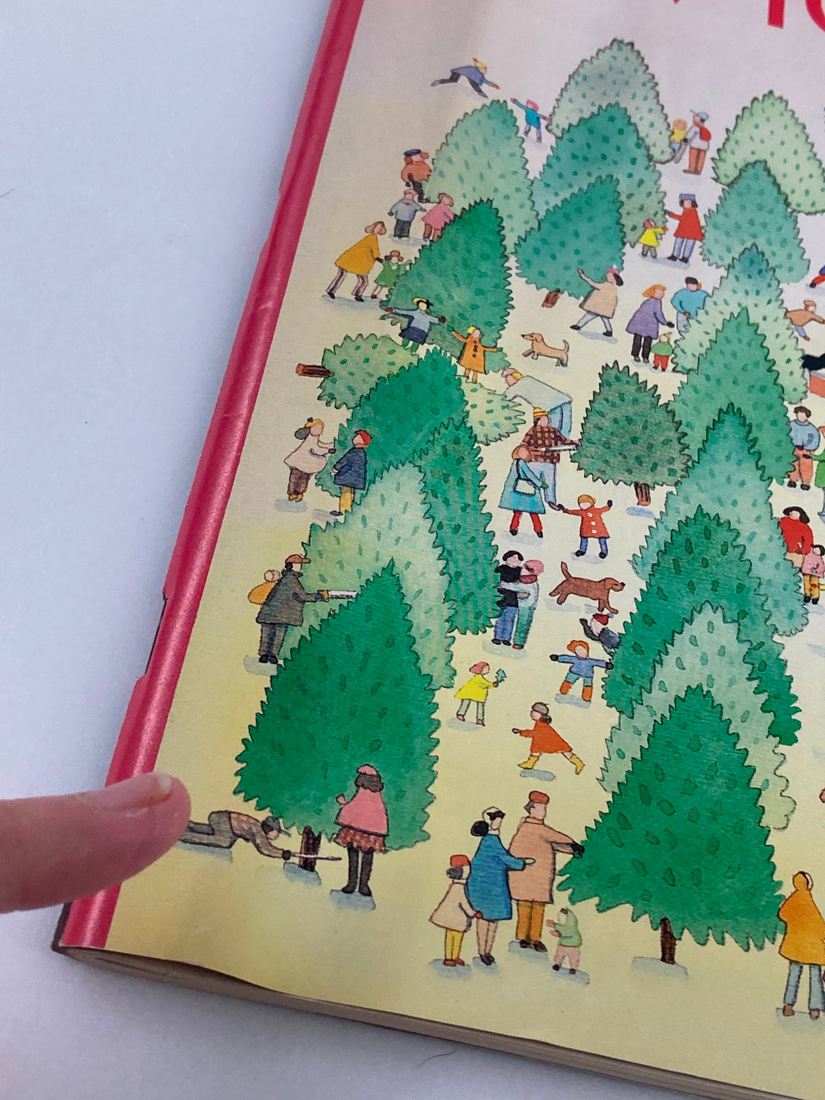 Close-up of the cover of The New Yorker Full Magazine December 18, 1989, highlighting Tree Hunting by S. Davis with people interacting among Christmas tree decorations.