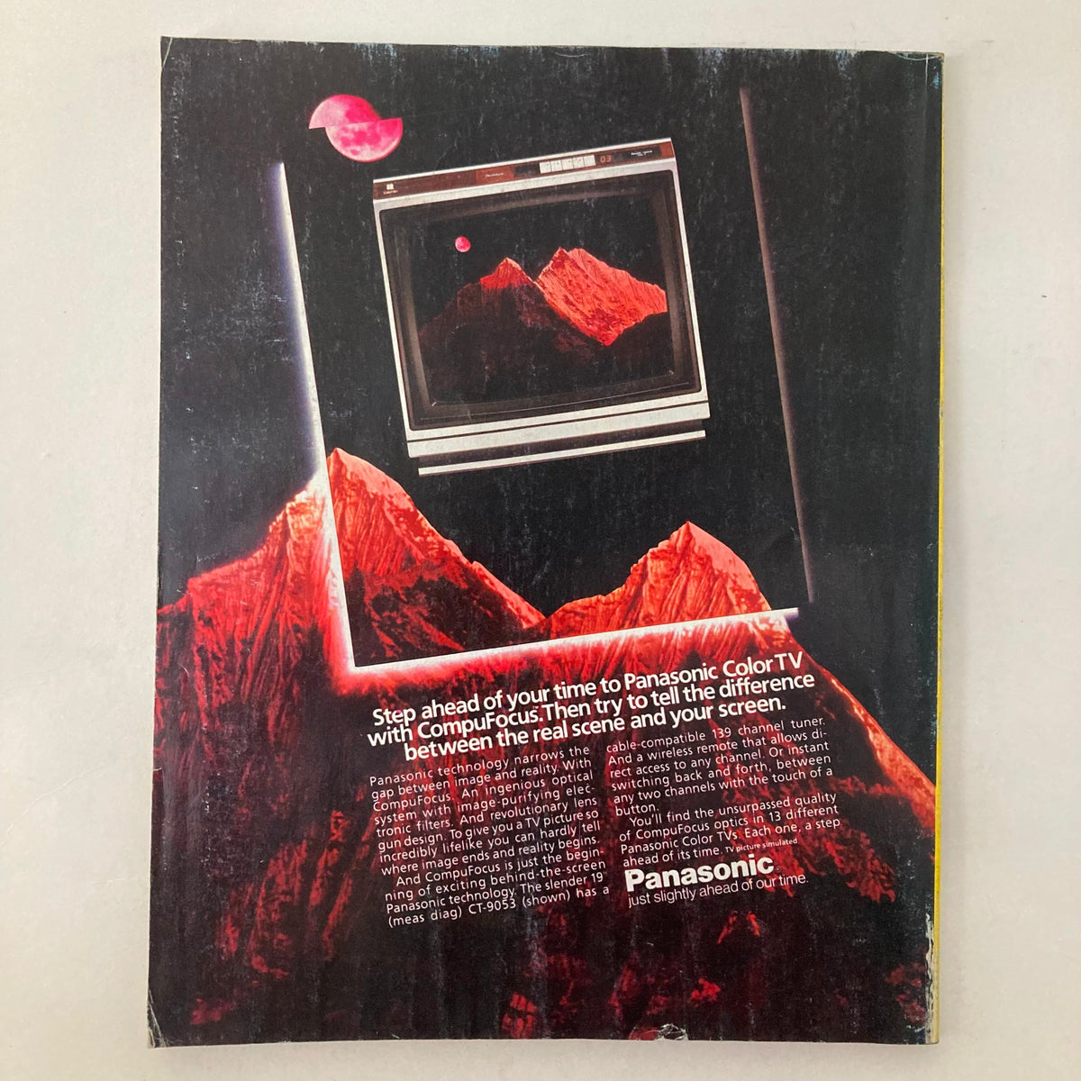 Back cover of Vintage Vanity Fair Magazine November 1983, featuring a retro advertisement for Panasonic Color TV with striking visuals and bold text.