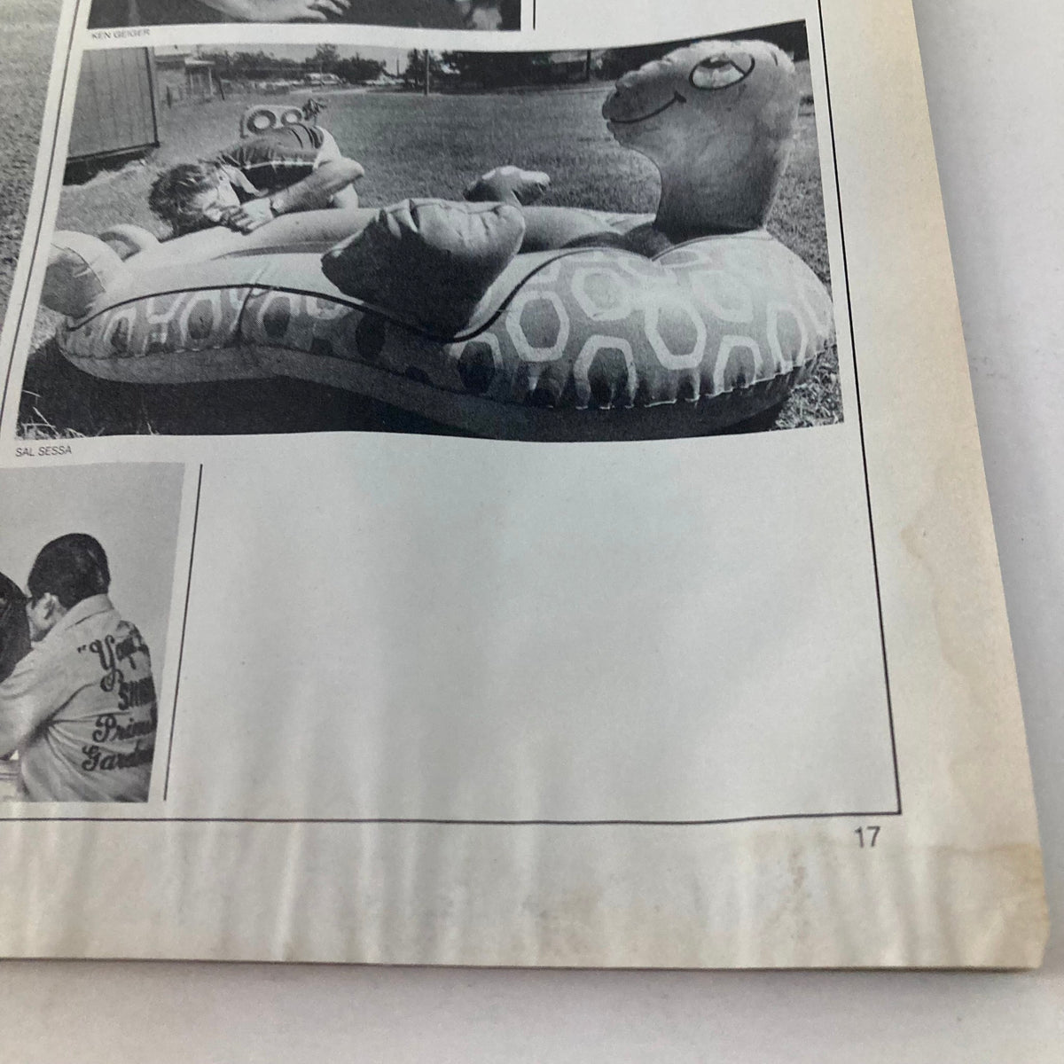 Another interior page from American Photographer Magazine August 1984, depicting a black and white photograph featuring a playful scene on an inflatable snail.