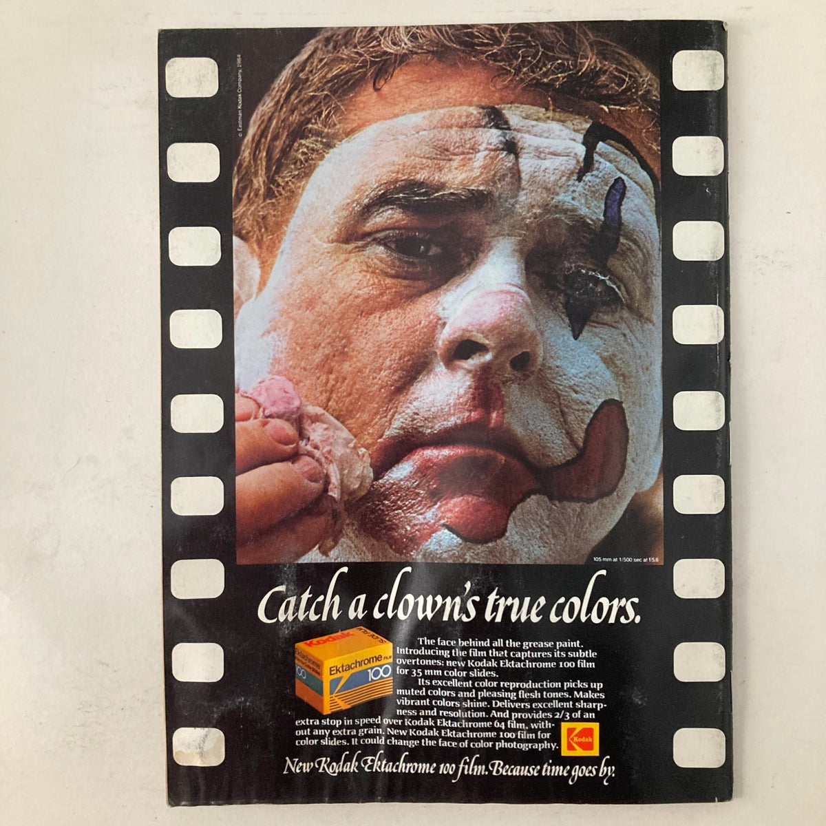 Kodak Ektachrome advertisement promoting film quality with an image of a performer preparing makeup, featured in American Photographer Magazine August 1984.