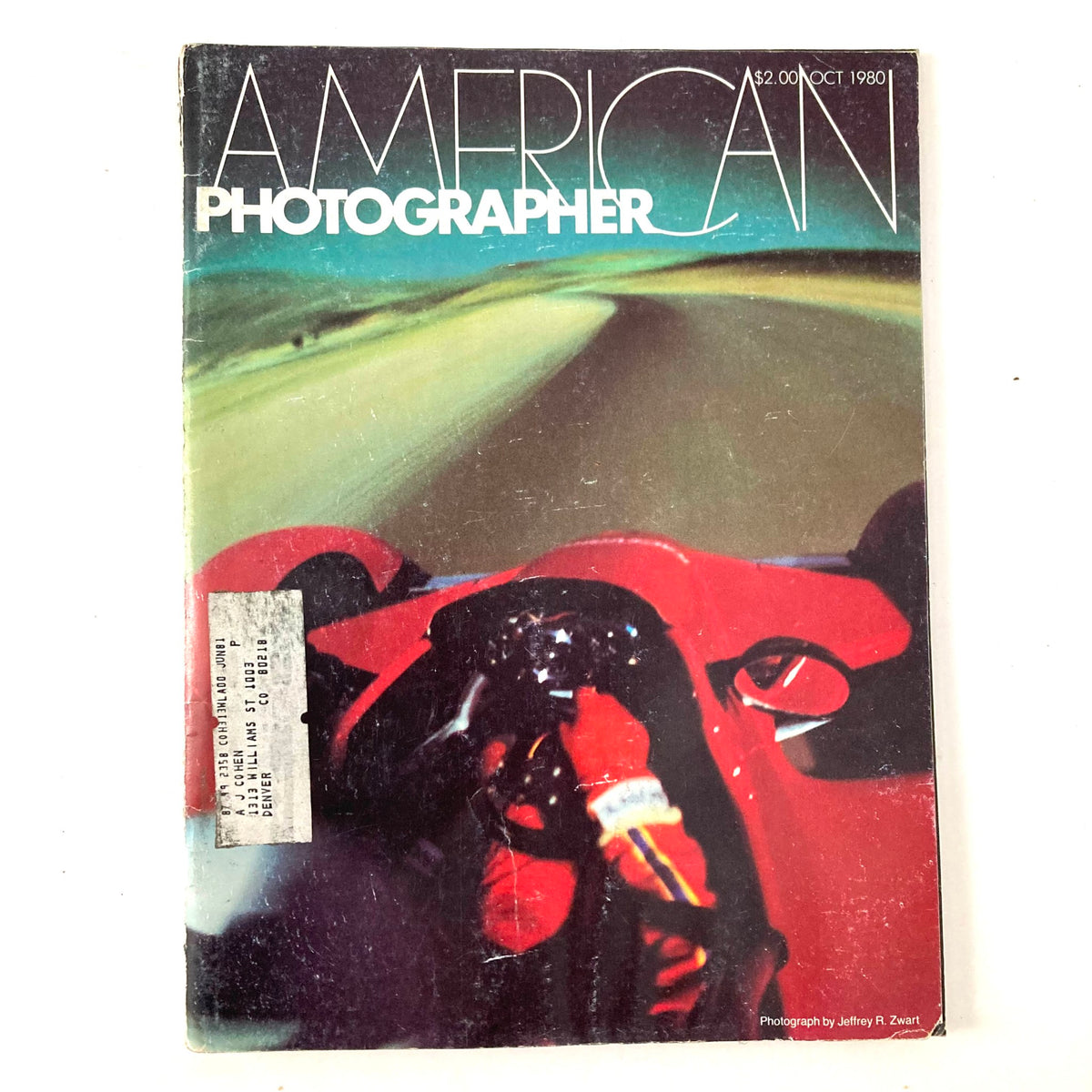 Cover of American Photographer Magazine, October 1980 featuring Tom Spalding's Can-Am Race Car, showcasing automotive photography and vintage magazine aesthetics.