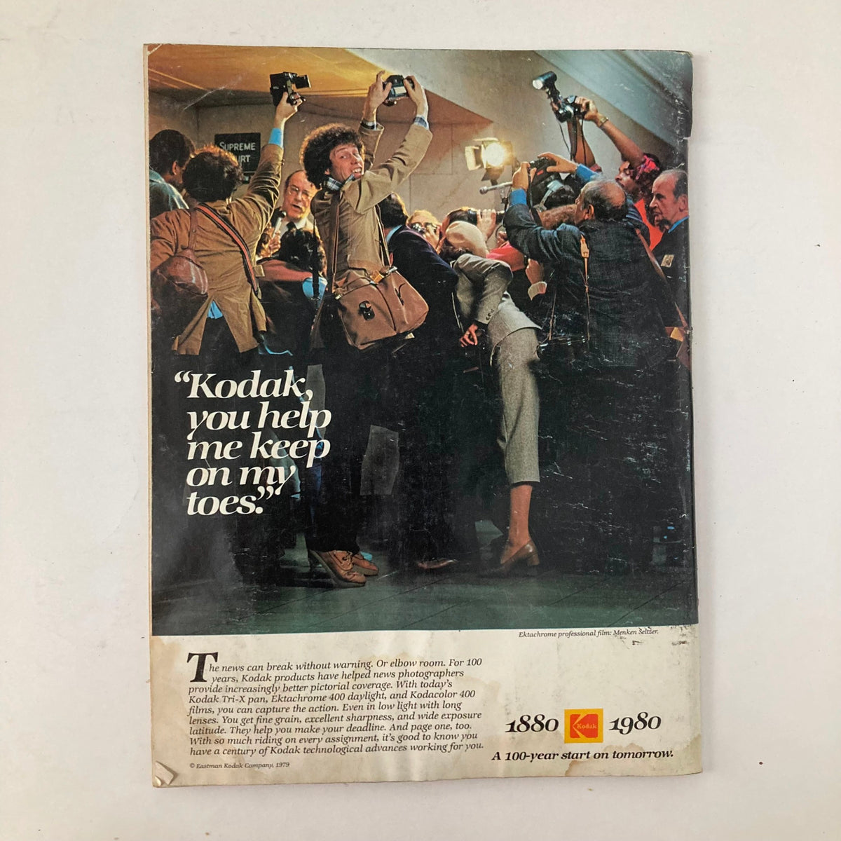 Back cover of American Photographer Magazine, October 1980, showcasing a Kodak advertisement with photographers capturing an event.