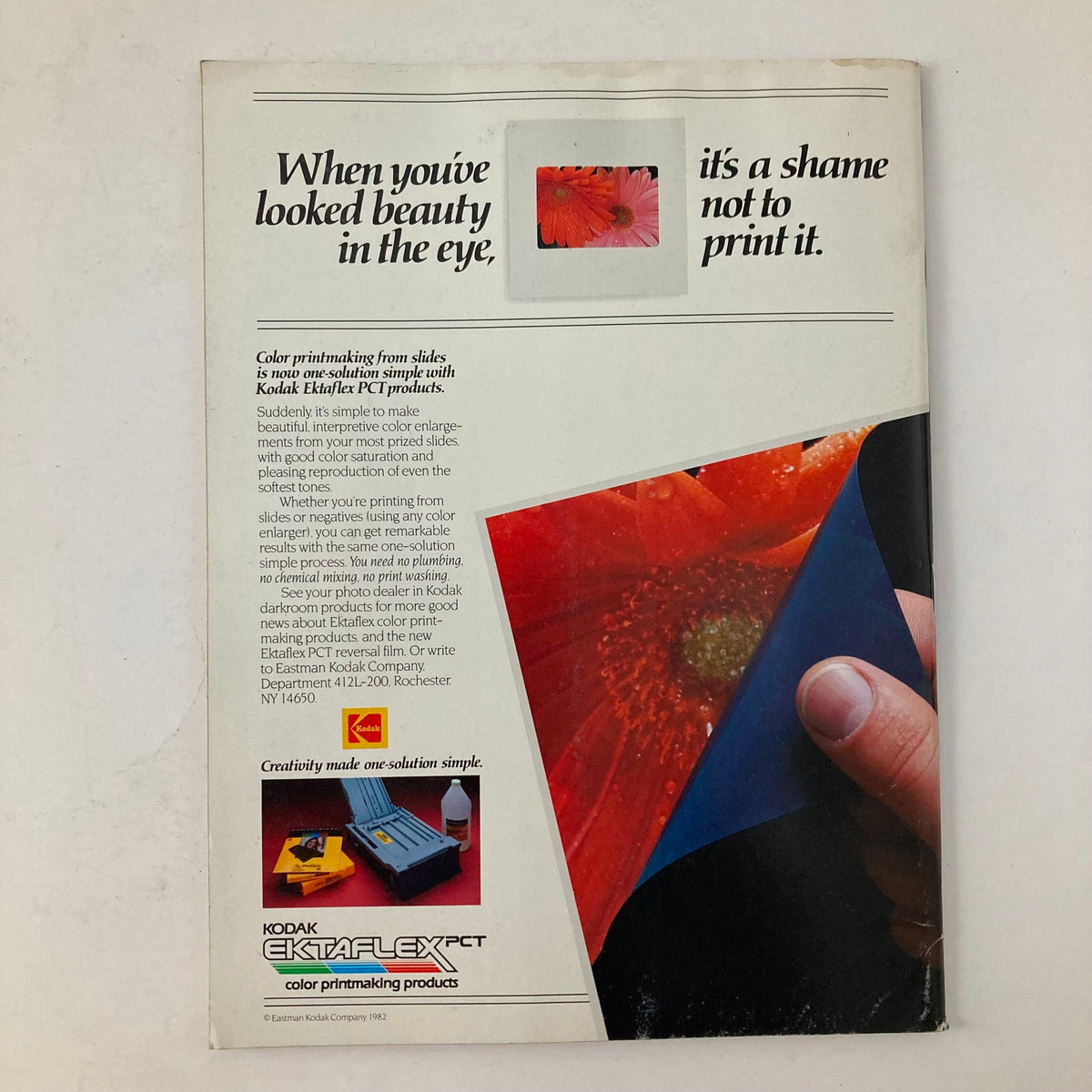 Back cover of American Photographer Magazine December 1982, featuring an advertisement for Kodak Ektaflex PCT color printmaking products, showcasing vibrant images and promoting photography techniques.