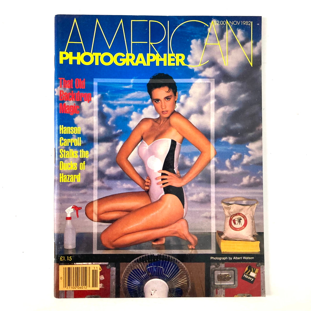 Cover of American Photographer Magazine November 1982 featuring model Julie Wolfe, showcasing iconic 80s fashion and photography, photographed by Albert Watson.