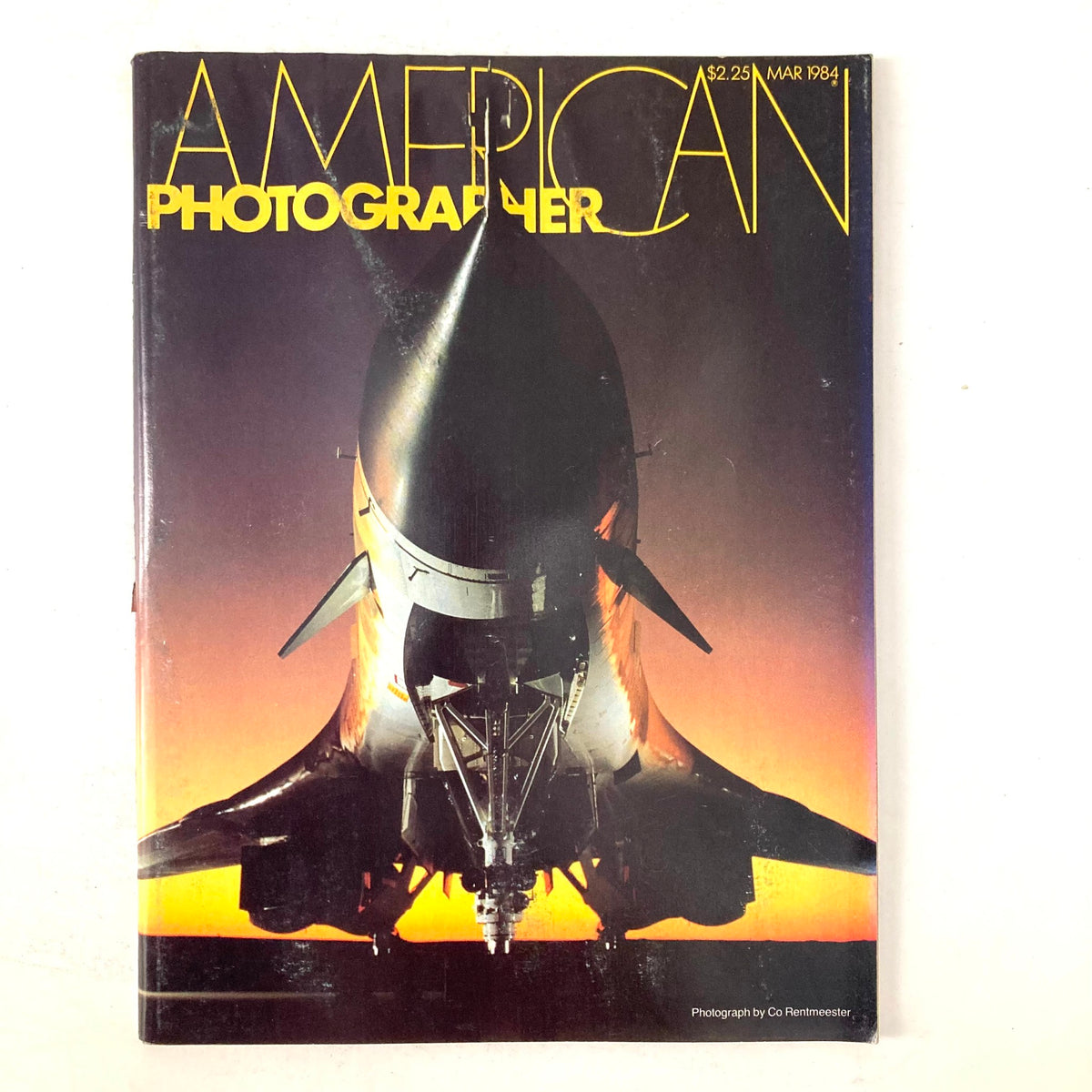 Cover of American Photographer Magazine March 1984 featuring a striking photograph of a B-1 Bomber.