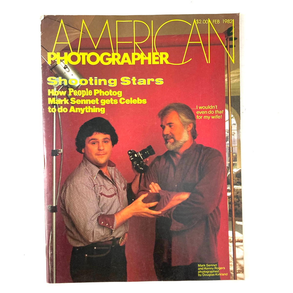 Cover of American Photographer Magazine February 1982 featuring Mark Sennet and Kenny Rogers, highlighting photography and celebrity culture.