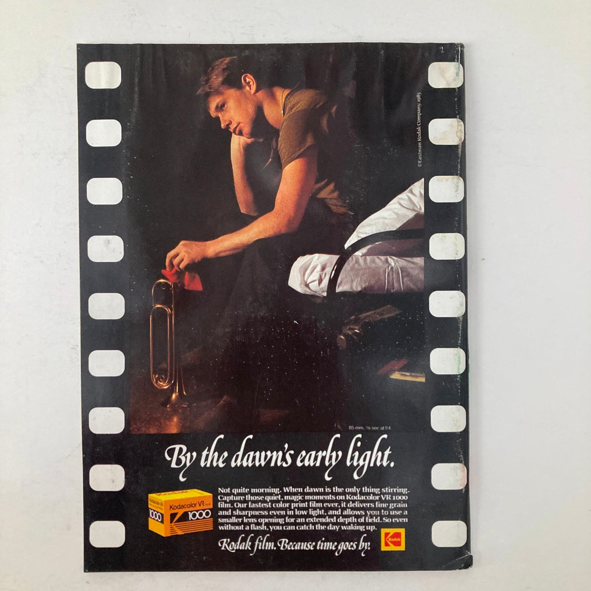 Back cover of American Photographer Magazine September 1985 advertising Kodak film, emphasizing the importance of capturing moments in photography.