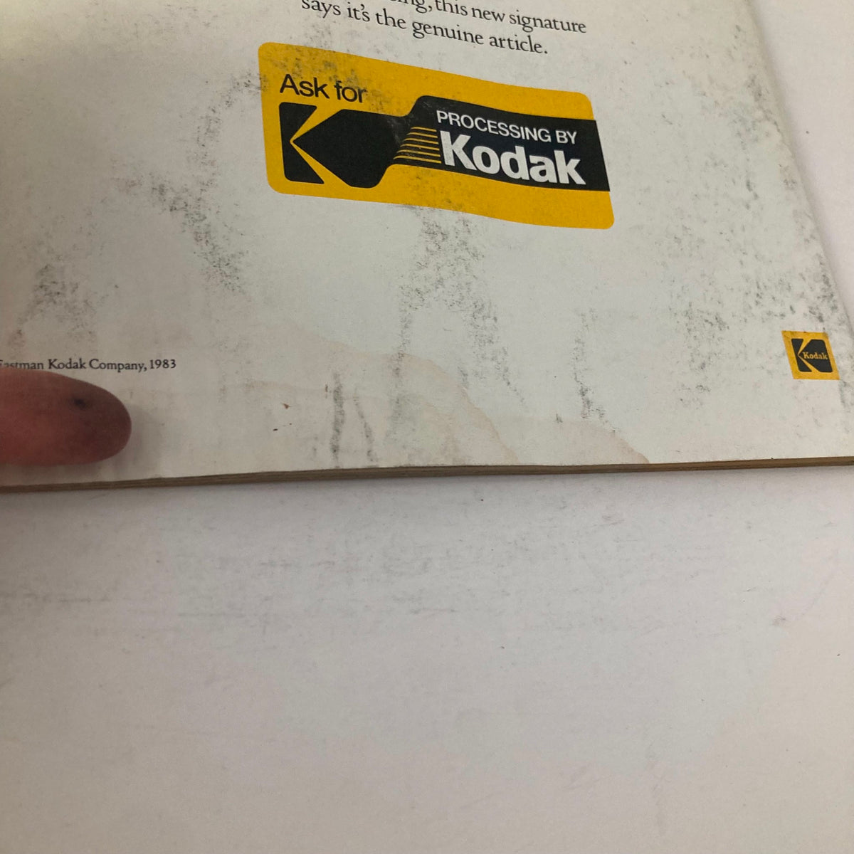 Close-up of the back cover of American Photographer Magazine August 1983, highlighting the Kodak processing advertisement and publisher information.