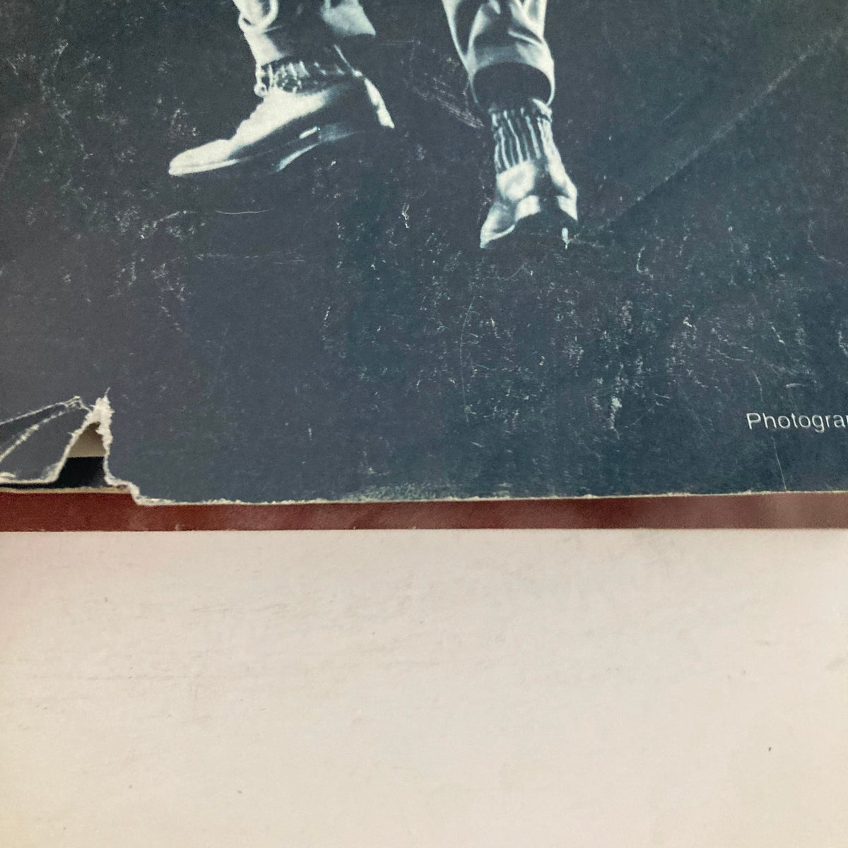 Close-up of the bottom left corner of the American Photographer Magazine November 1980, showing wear and tear on the cover.