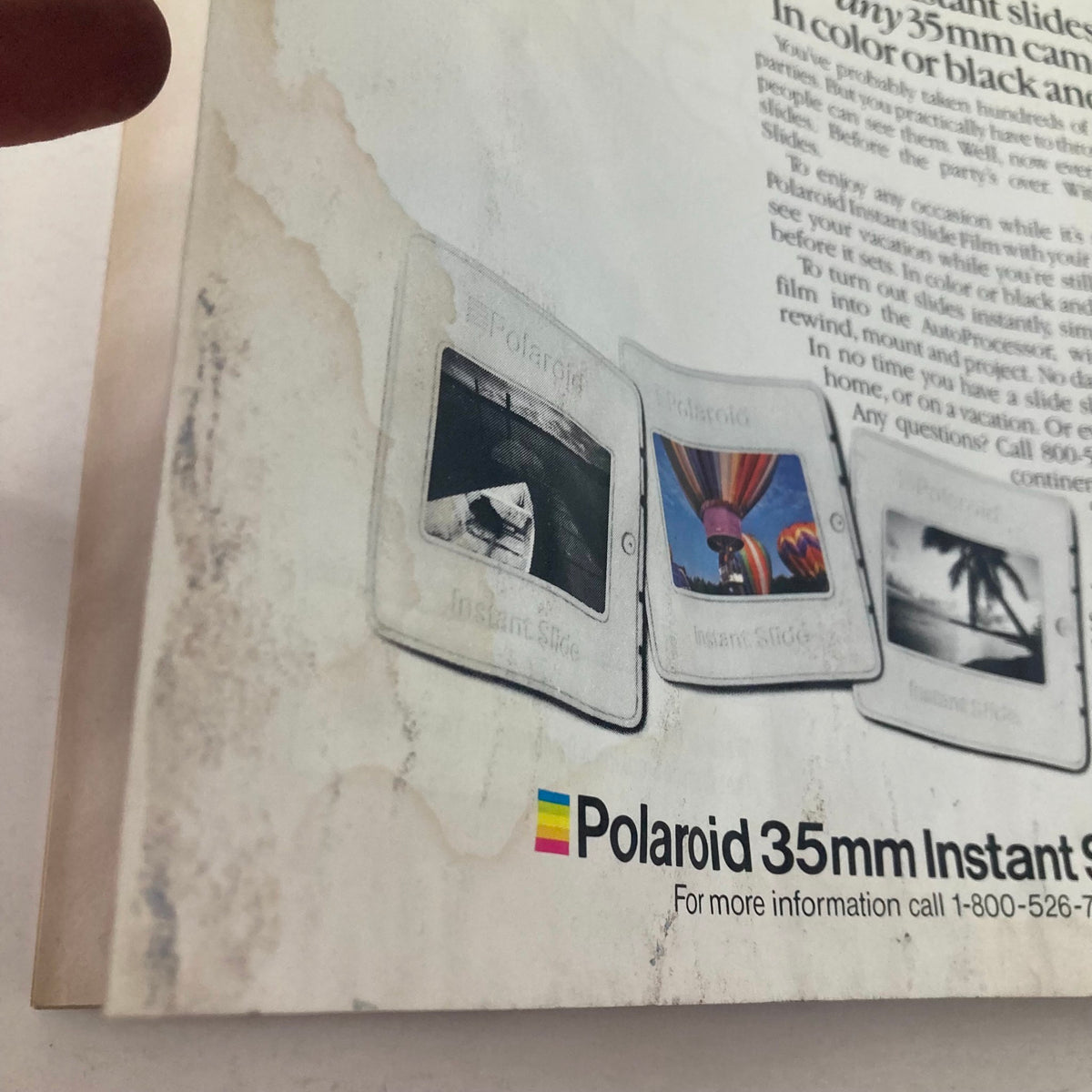 Close-up of Polaroid advertisement from American Photographer Magazine March 1985 featuring instant slide film options for 35mm cameras.