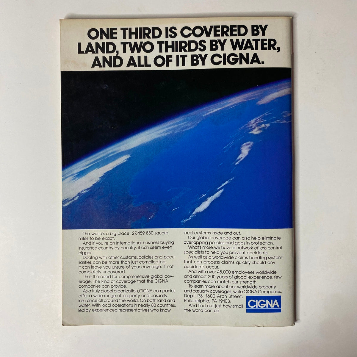 Back cover of Forbes Magazine August 7, 1989, showcasing a Cigna insurance advertisement featuring an image of Earth from space.