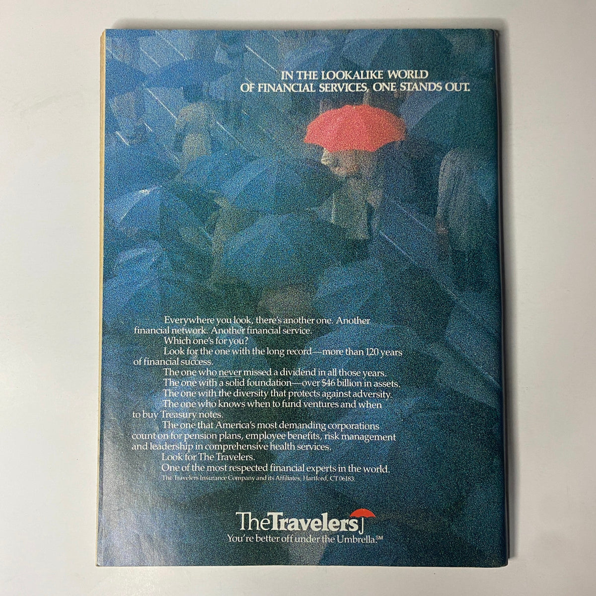 Back cover of Forbes Magazine March 21, 1988, featuring an advertisement for The Travelers, focusing on financial services and emphasizing the importance of choosing reliable financial partners.