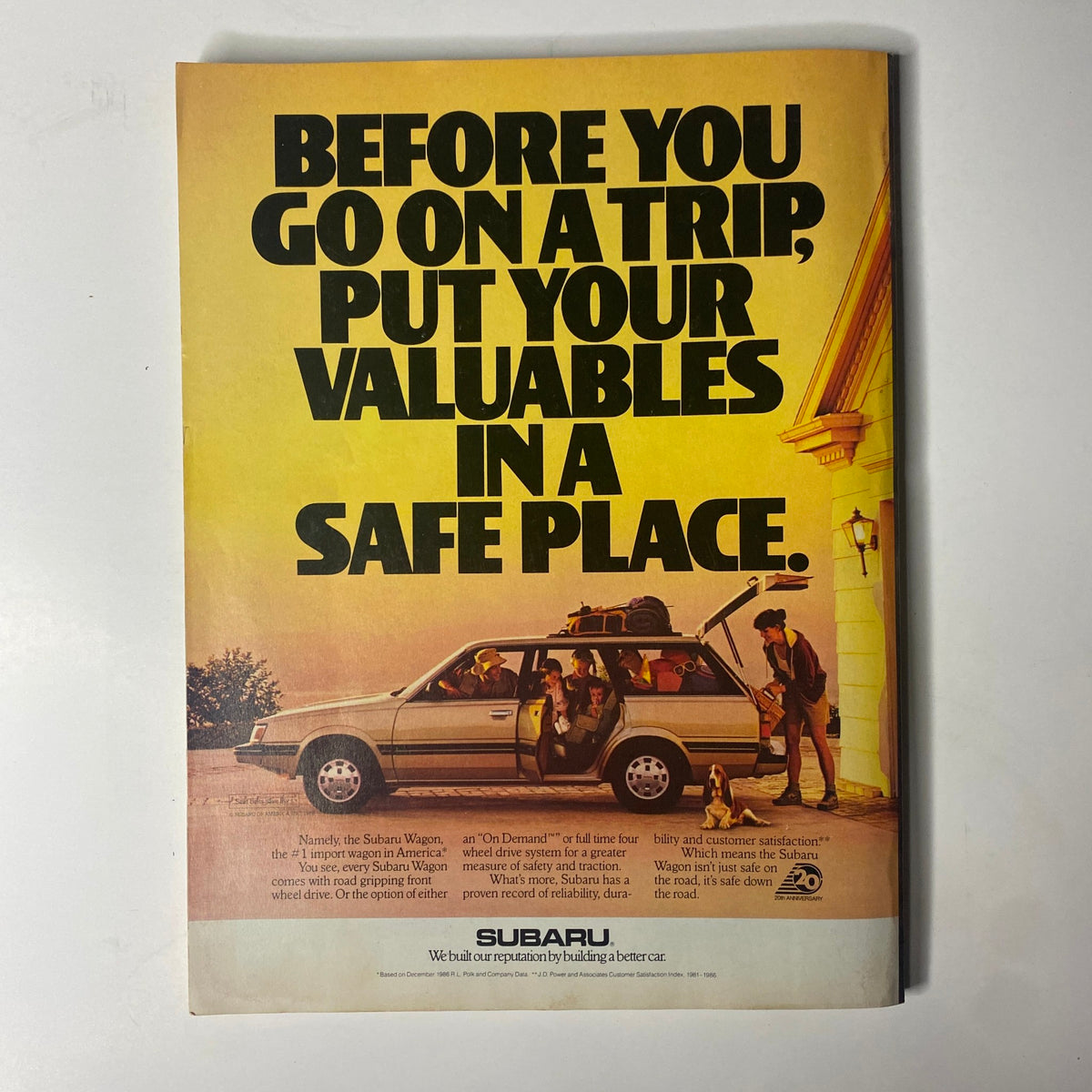 Back cover of Forbes Magazine January 11, 1988 featuring an advertisement for Subaru with a focus on safety and reliability during travel.