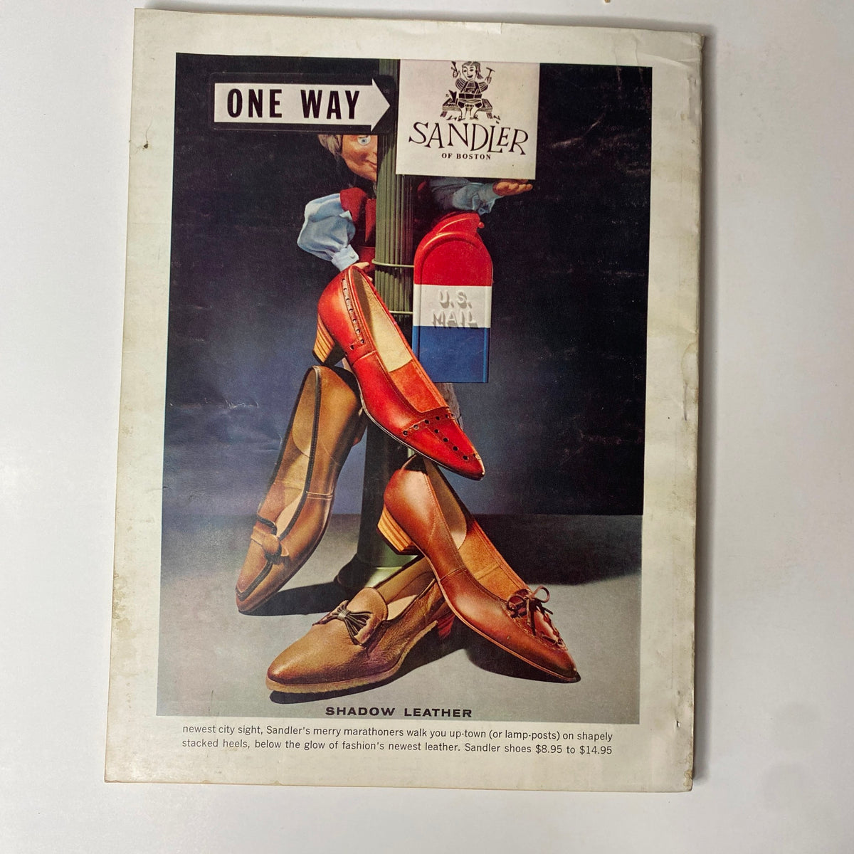 Glamour Magazine August 1962 with an advertisement for Sandler shoes displaying a variety of stylish footwear, showcasing vintage fashion accessories from the era.