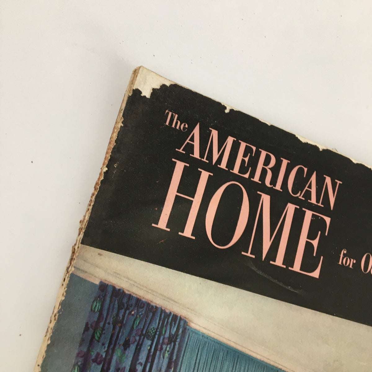 Close-up of the top corner of VTG The American Home Magazine October 1951, emphasizing the title and vintage charm of the magazine.