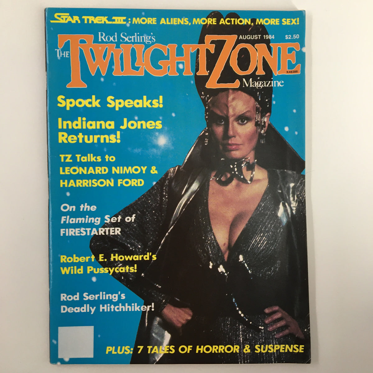 Cover of the Twilight Zone Magazine August 1984 featuring a bold blue background, showcasing the title 'The Twilight Zone Magazine' along with the subtitle highlighting interviews with Leonard Nimoy and Harrison Ford. Includes promotional text about science fiction content and iconic characters in pop culture.