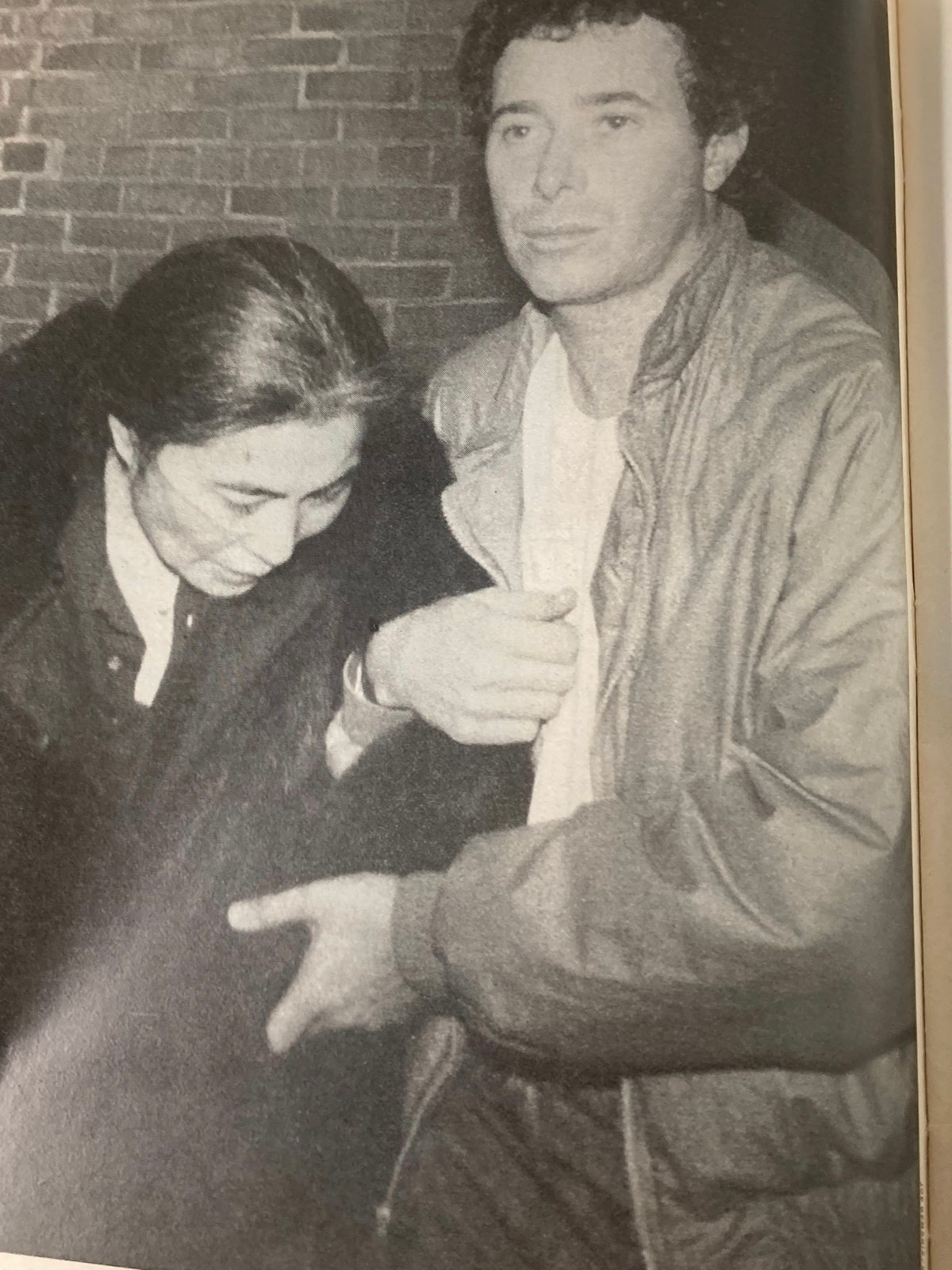 Image from VTG People Weekly Magazine December 22 1980 featuring Yoko Ono and a man, depicting an emotional moment during a pivotal time in pop culture.