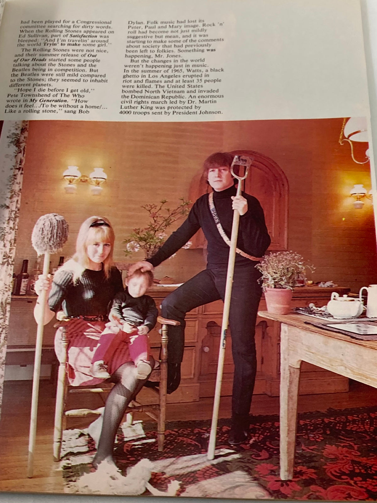 A vintage photo from the 1981 The Beatles' John Lennon 1940-1980 A Memorial Album featuring John Lennon with family and friends.
