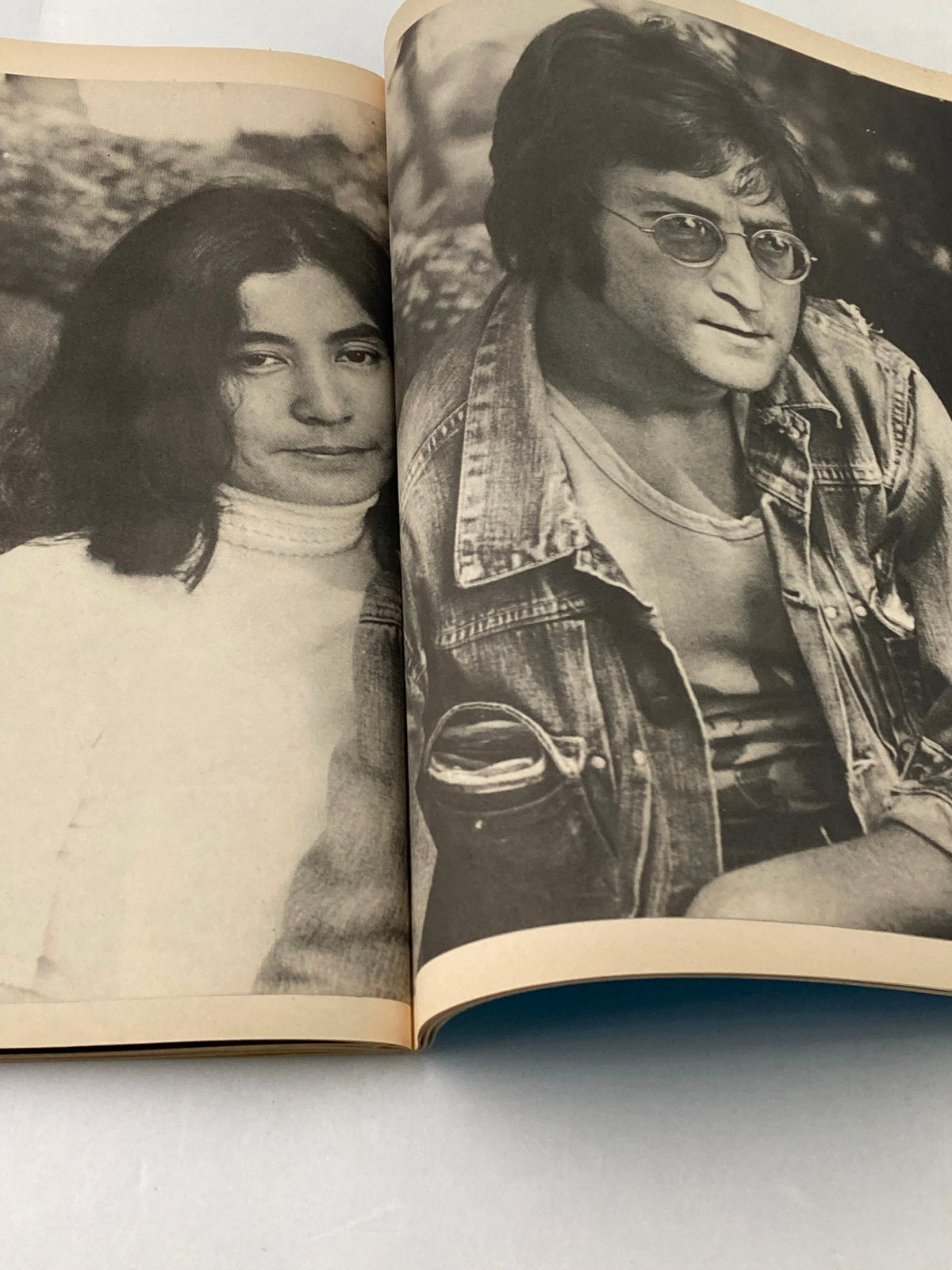 Photograph of John Lennon and Yoko Ono featured in the 1981 The Beatles' John Lennon 1940-1980 A Memorial Album, highlighting their artistic partnership.