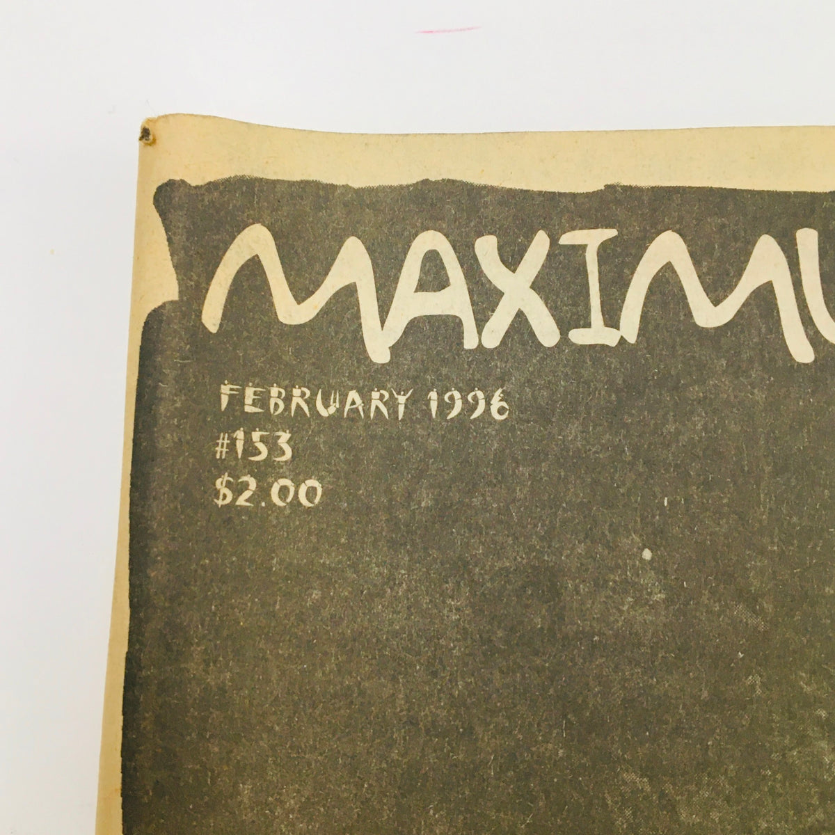 Close-up of the top portion of Maximum RocknRoll Magazine February 1996 #153, highlighting the magazine's title, date, and price in a vintage design.