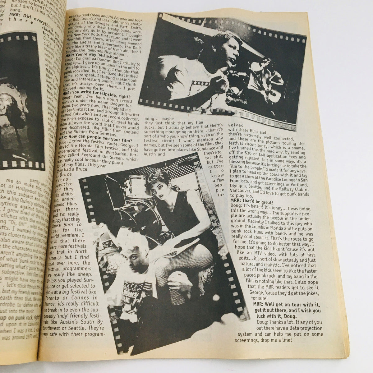 Interior pages of Maximum RocknRoll Magazine September 1997 #172, featuring articles and images related to punk music and culture.