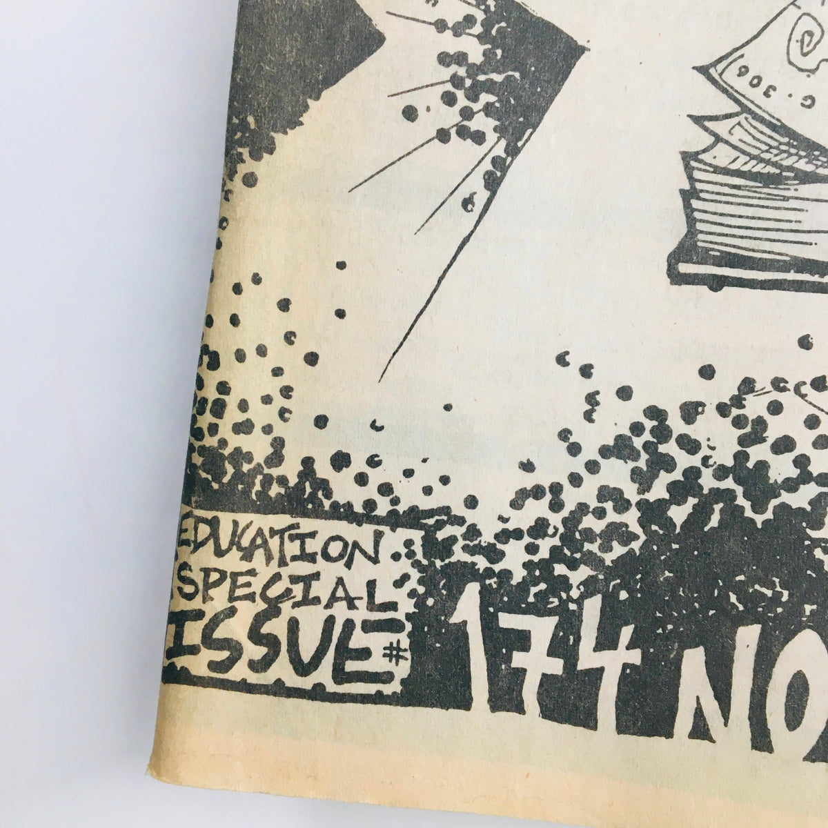Close-up of the bottom corner of Maximum RocknRoll Magazine November 1997 Issue #174 displaying the Education Special Issue label and pricing details.