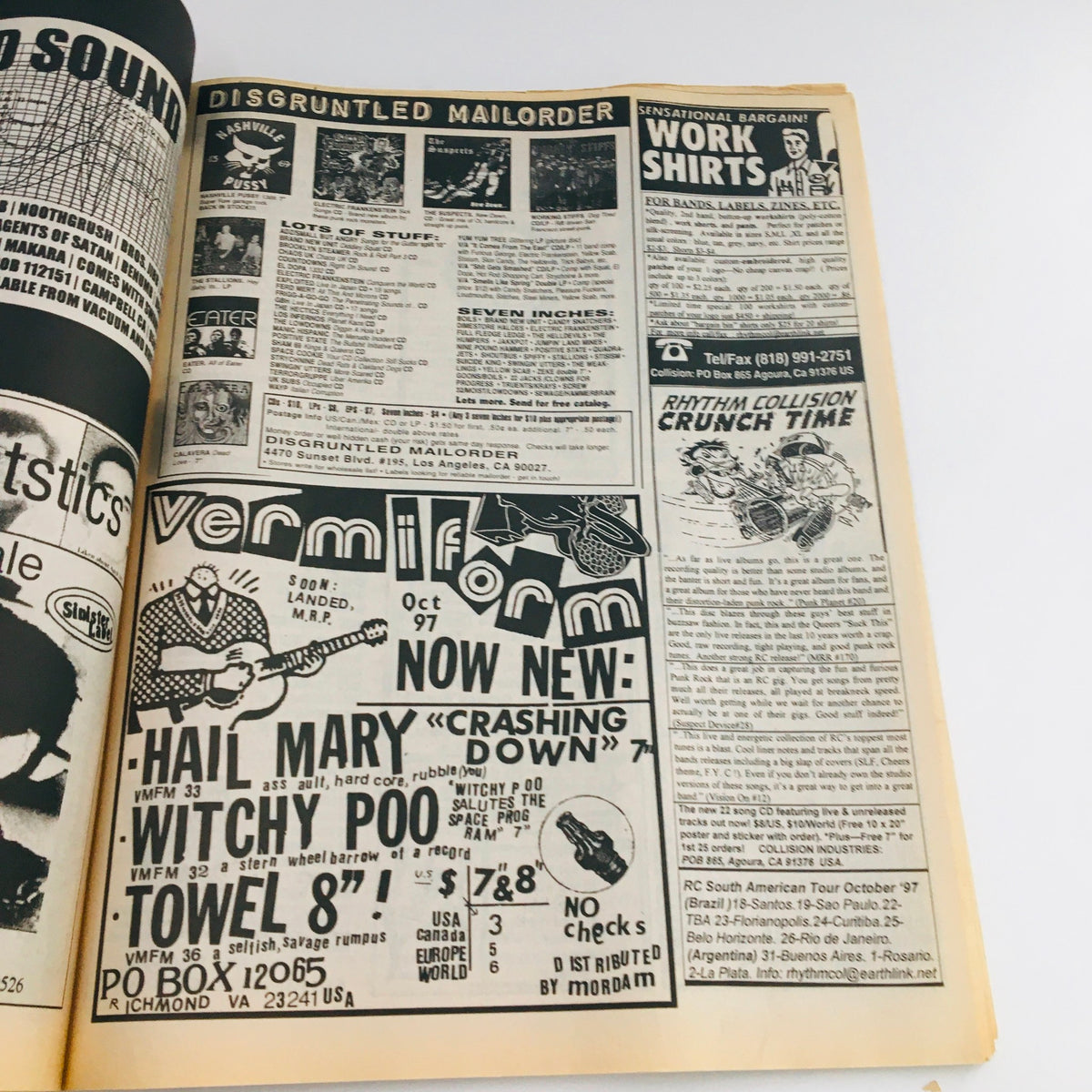 Interior page from Maximum RocknRoll Magazine November 1997 Issue #174 showcasing advertisements for punk music and merchandise.