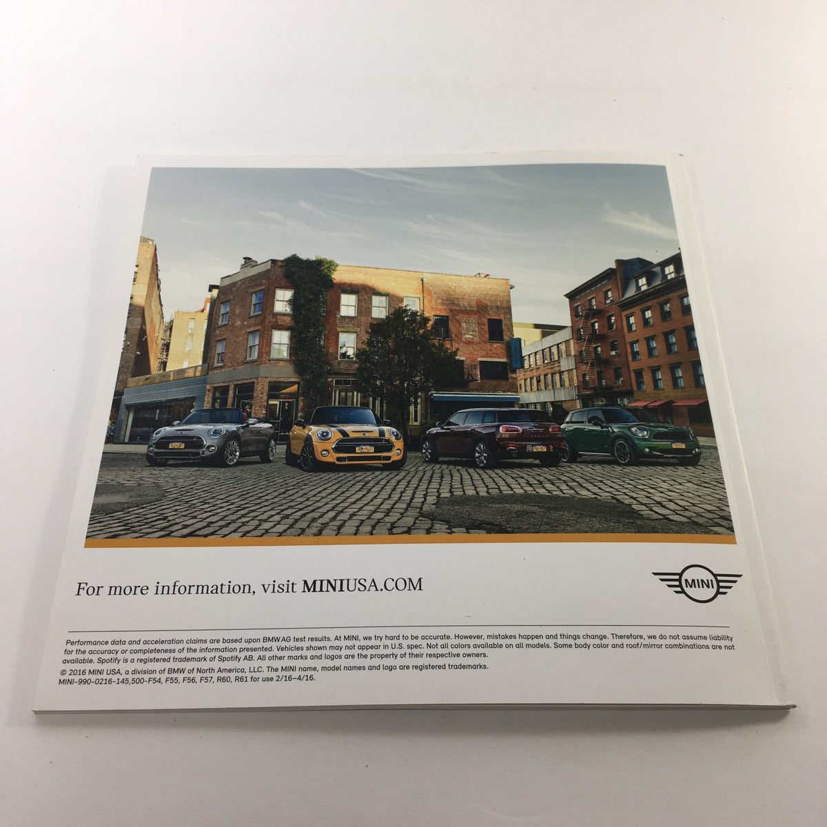 2016 Mini Cooper Motor The Spectrum Colors Dealership Car Auto Brochure Catalog back cover featuring multiple Mini Cooper vehicles parked in an urban setting.