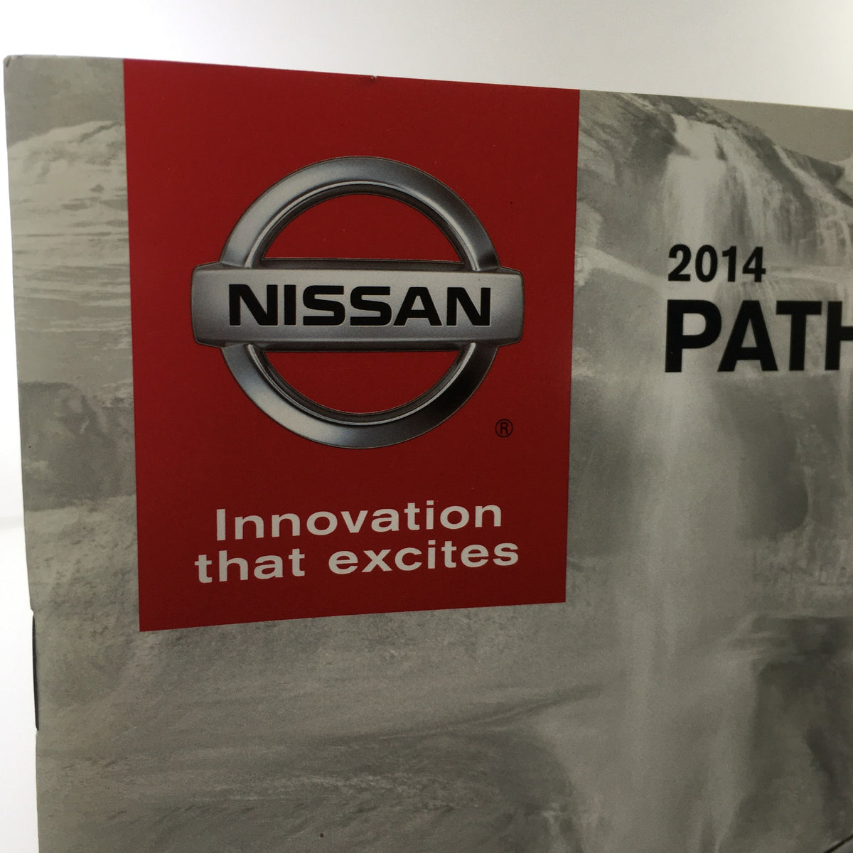 2014 Nissan Pathfinder SUV Dealership Car Auto Brochure Catalog featuring the Nissan logo with a slogan 'Innovation that excites'.