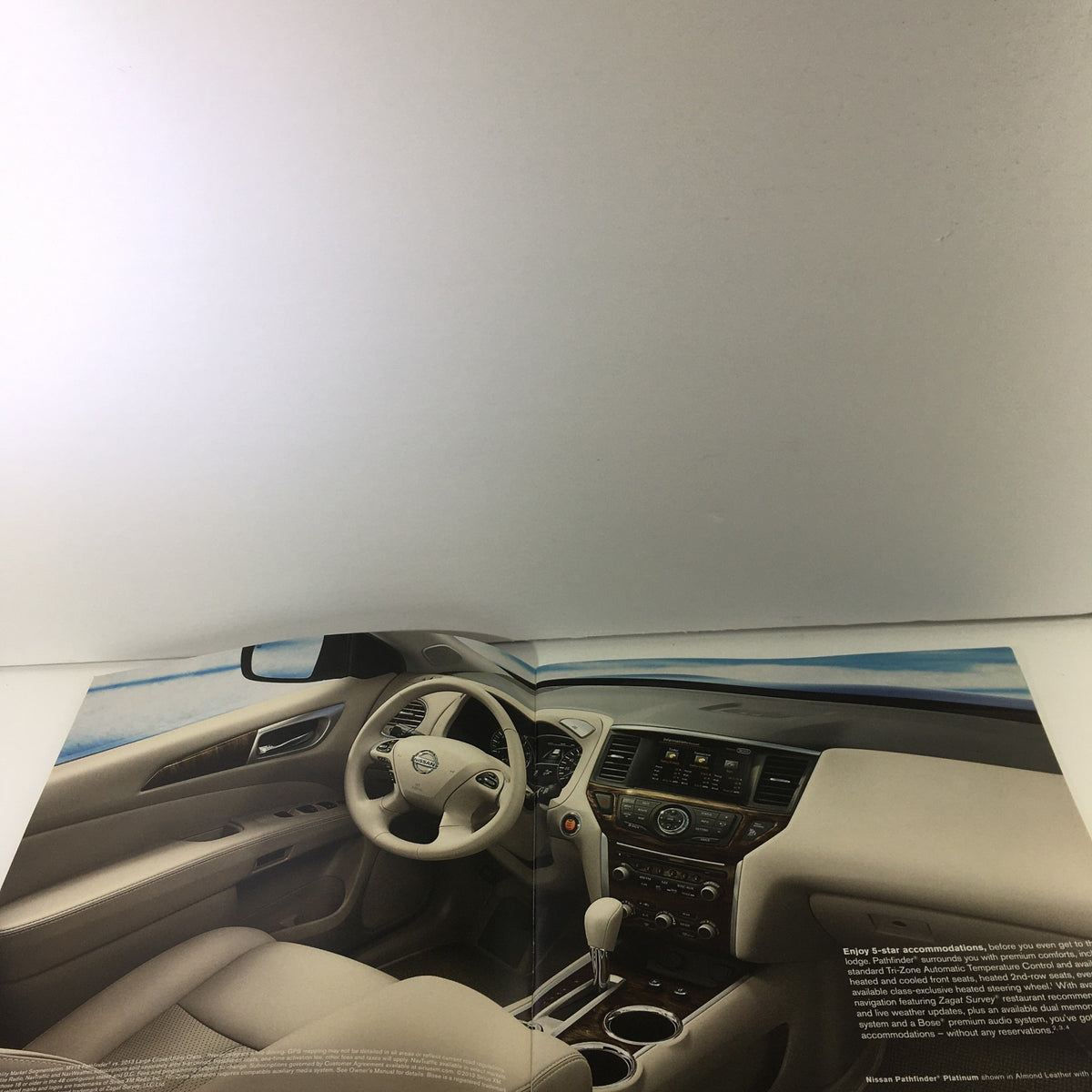 Interior page of the 2014 Nissan Pathfinder SUV Dealership Car Auto Brochure Catalog highlighting the spacious and modern cabin design.
