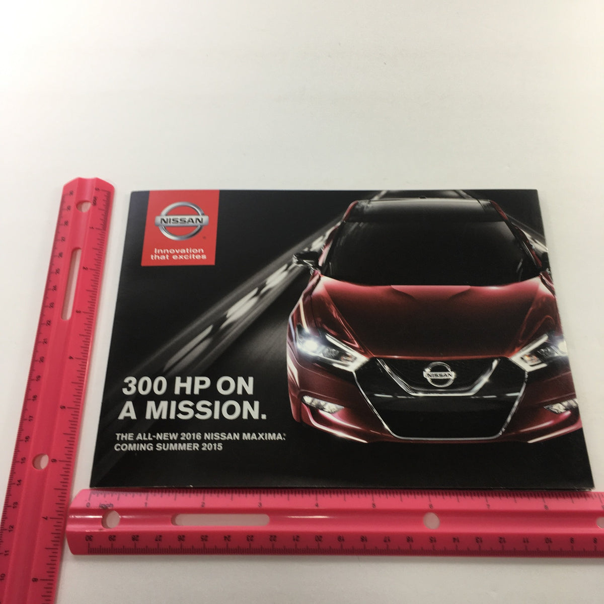 Front cover of the 2016 Nissan Maxima brochure highlighting the sleek exterior design. Part of the 2016 Nissan Maxima 300-HP On A Mission Dealership Car Auto Brochure Catalog.