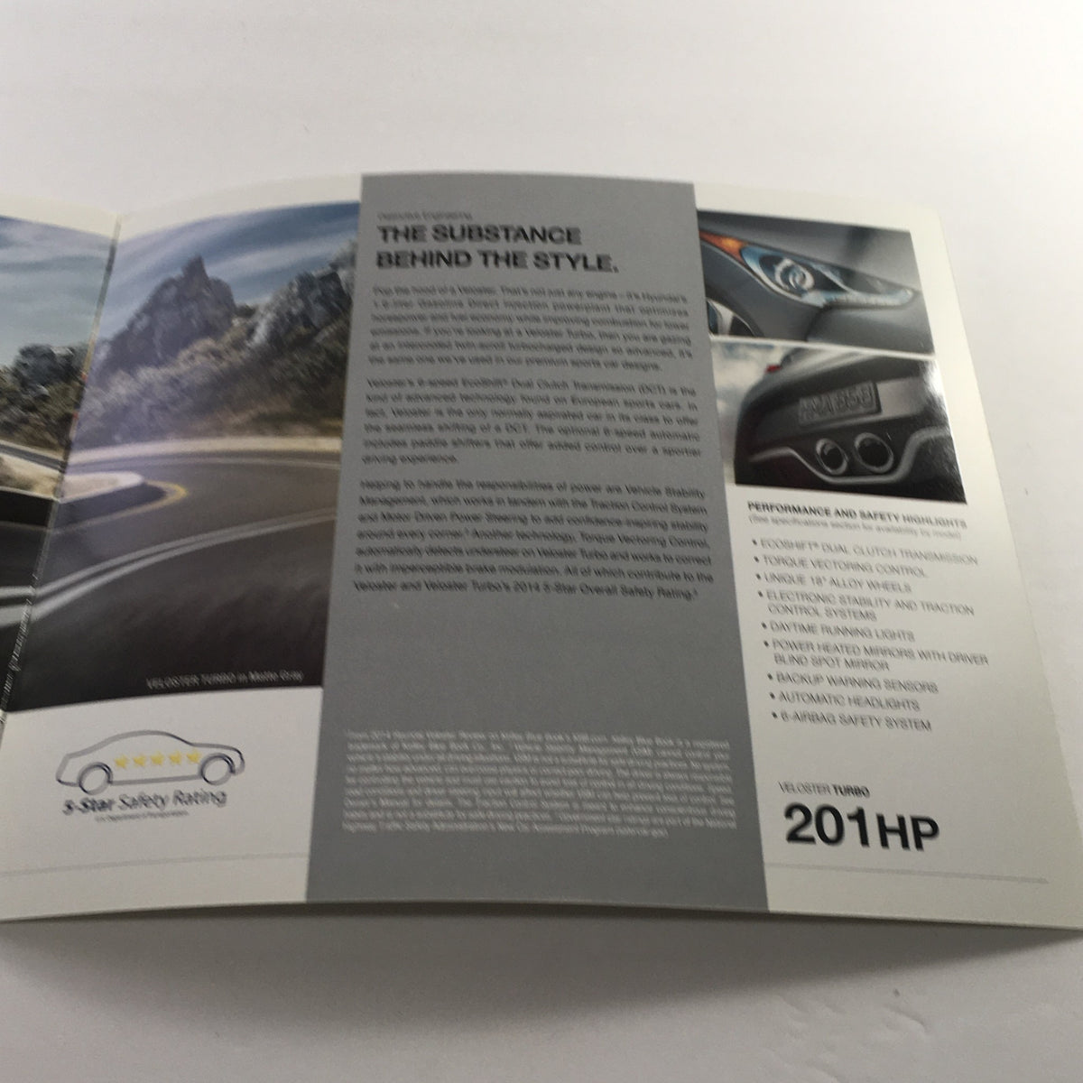 Detailed overview page from the 2015 Hyundai Veloster Dealership Car Auto Brochure catalog discussing performance specifications and safety ratings.