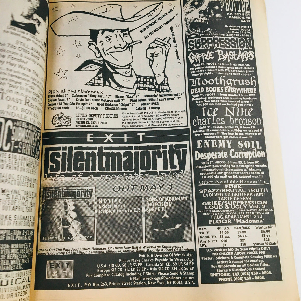 Inside page of Maximum RocknRoll Magazine May 1997 #168, featuring advertisements related to the punk rock scene.