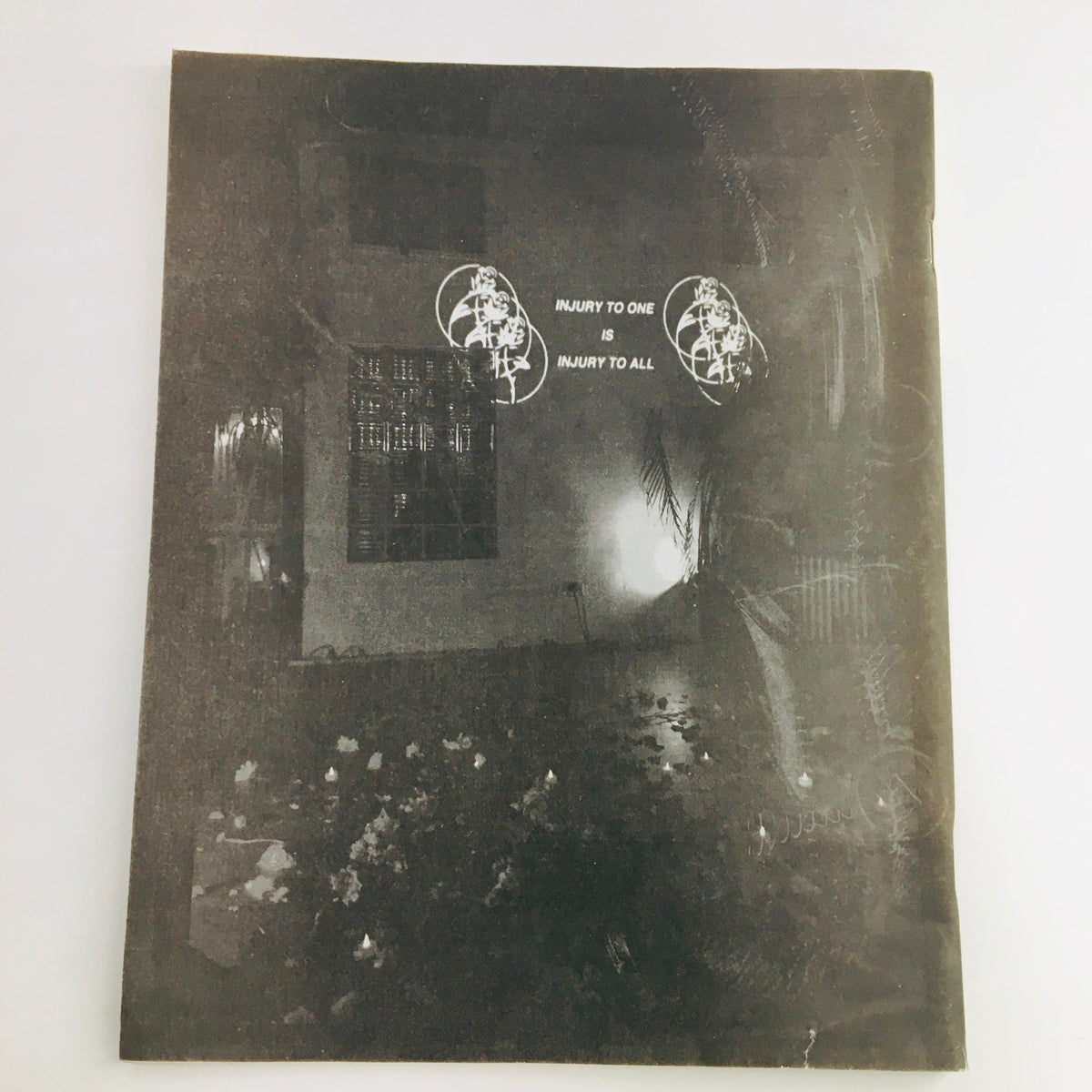 A dark, artistic image featured in Maximum RocknRoll Magazine February 2017 #405, emphasizing the punk scene's aesthetic.